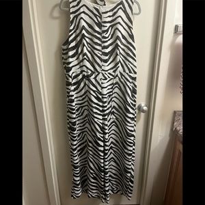 Green black and white zebra jump suit with wide legs and large pockets.